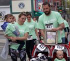 Team Addilyn, which walked in memory of Addilyn Sophia Davis and to raise awareness of Krabbe Disease, crossed the finish line together at the end of the Androscoggin Home Healthcare and Hospice House 5K and Remembrance Walk in Farmington Sunday.