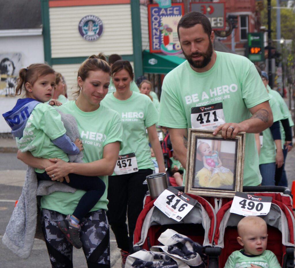 Team Addilyn, which walked in memory of Addilyn Sophia Davis and to raise awareness of Krabbe Disease, crossed the finish line together at the end of the Androscoggin Home Healthcare and Hospice House 5K and Remembrance Walk in Farmington Sunday.